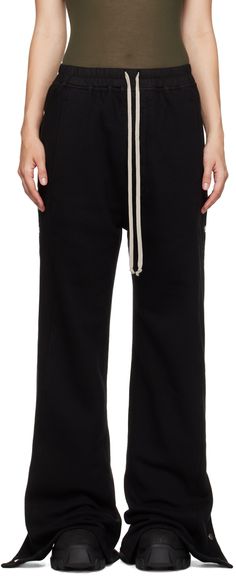 Wide-leg and heavyweight organic cotton fleece lounge pants. · GOTS-certified cotton · Garment-dyed · Drawstring at elasticized poplin waistband · Four-pocket styling · Button-fly · Press-stud vent at outseams Supplier color: Black Rick Owens Drkshdw, Sleepwear & Loungewear, Cotton Fleece, Press Studs, Lounge Pants, Rick Owens, Apparel Accessories, Lounge Wear, Wide Leg