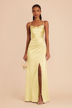 This matte satin cowl neck bridesmaid dress with ultra-glam ruching is ready for her day in the sun. Available in Lemon Sorbet. A modern mermaid skirt and cool cowl neck join forces to bring you Lydia: a showstopping bridesmaid dress for a glamorous wedding. | Lemon Sorbet Bridesmaid Dress Matte Satin Size 1X | Birdy Grey Lydia Formal Dresses Long Yellow, Golden Yellow Prom Dress, Pretty Yellow Prom Dresses, Yellow Long Dress Formal, Pastel Yellow Long Dress, Light Yellow Prom Dress Long, Soft Yellow Prom Dress, Long Dress Hoco, Prom Dresses Light Yellow