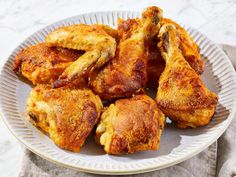 some fried chicken on a white plate