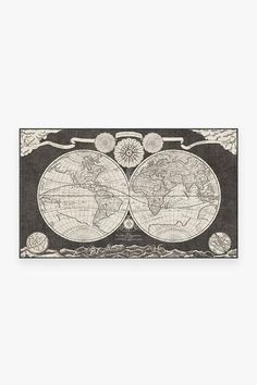 an old world map on black and white paper with two globes in the middle