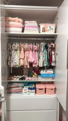 the closet is full of baby clothes and diapers