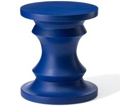 a blue stool sitting on top of a white floor