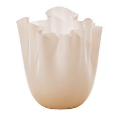 a large white vase sitting on top of a table