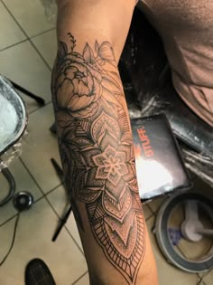 a person with a tattoo on their arm