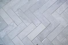 an open umbrella sitting on top of a tiled floor