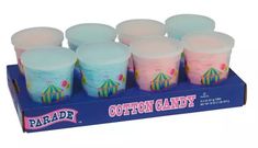 six cotton candy cups sitting in a cardboard box