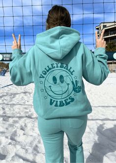 Peace, Smile, Volleyball Sweatpants Make a statement in your game with Peace, Smile, Volleyball Sweatpants and maintain good vibes all day long. Enjoy unbeatable comfort with stylish, for long days on the court and beyond. Make it a set with our matching teal hoodie! Sand Volleyball Outfit, Volleyball Merch, Volleyball Sweatpants, Volleyball Vibes, Teal Hoodie, Volleyball Sweatshirts, Volleyball Hoodie, Volleyball Clothes, Volleyball Shirts