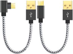 two black and white cables connected to each other with gold colored connectors on them