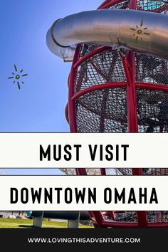 an amusement park with the words must visit downtown omaha