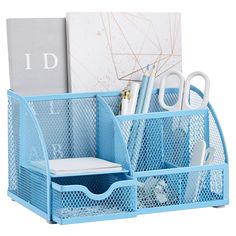 a blue desk caddy with pens, scissors and other office supplies