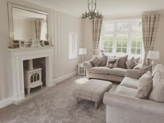 a living room filled with furniture and a fire place in front of a mirror on the wall