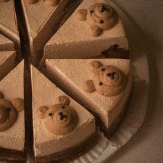 a cake with teddy bears cut into slices