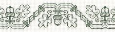 the cross stitch pattern is in green and white