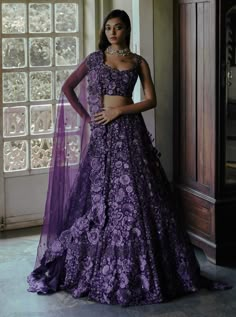 Editor's Note Purple Organza Lehenga With Floral Embroidery Teamed With Corset Blouse With Scallop Detail And Cutwork Organza Dupatta Color: Purple Fabric: Organza, Chanderi Care: Dry Clean Only About the Designer Mishru is a reflection of the latest trends and styles to give you that classic Indian look. Mishru is a customisable collection of traditional wear that invites you to give design inputs. Mishru Couture Line ensures that you never ever have to look around the room to check if anybody Lavender Indian Wedding Dress, Dark Purple Lehenga Bridal, Royal Purple Lehenga, Purple Lengha Bridal, Dark Purple Lengha, Purple Indian Outfit, Purple Indian Dress, Purple Bridal Lehenga