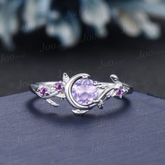 Vintage Moon Star Round Natural Lavender Amethyst Promise Ring White Gold Nature Inspired Engagement Ring Branch Leaf Crystal Amethyst Wedding Ring HOW TO STYLE : This Lavender Amethyst ring in sterling silver packaged in delicated gift box ,It is the most versatile and elegant statement ring for casual days in the office and nights out. It's your go-to statement piece whatever the occasion. It also can be personalized to show your uniqueness in the party, date, banquet. AFTER-SALE SERVICE : 30 days money-back guarantee and for any reason, you are not satisfied with your purchase, please contact me and I will quickly handle your request within 24 hours. DETAILS: - Material : 925 Sterling Silver (Hypoallergenic, Nickel Free, Tarnish Resistant)Solid 14k/18k gold,platinum PLEASE choose silver Celestial Purple Round Jewelry, Purple Celestial Round Jewelry, Celestial Amethyst Purple Jewelry, Purple Amethyst Celestial Jewelry, Celestial Purple Amethyst Jewelry, Purple Moonstone Ring For Anniversary, Purple Moonstone Gemstone Ring For Anniversary, Amethyst Wedding Rings, Leaf Wedding Rings