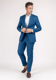 The Hudson Marine Blue Linen Suit is the perfect expression of summer luxury. Crafted from 100% linen in a vibrant marine blue hue, this custom suit will make an elegant statement wherever you wear it. Perfect for hot summer days, its lightweight fabric will keep you looking sharp while feeling cool and comfortable. Blue Linen Business Blazer, Blue Linen Blazer For Business, Summer Linen Business Suits, Blue Linen Blazer For Semi-formal Occasions, Fitted Linen Summer Suits, Summer Fitted Linen Suit, Tailored Linen Summer Suits, Fitted Blue Linen Blazer, Luxury Summer Blazer