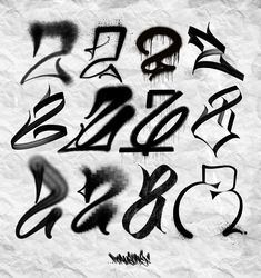 some type of graffiti written in black and white on a piece of paper with the letters below it