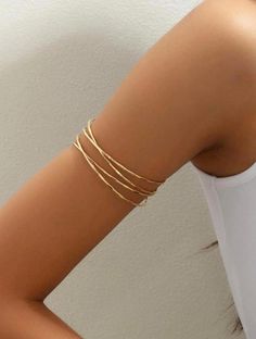 ✨ Elegant Design: Elevate your style with our Minimalist Gold Arm Cuff, designed to add a touch of sophistication to any outfit. Crafted in radiant gold, this elegant accessory exudes modernity and timeless charm. 🌟 Premium Quality: Crafted from high-quality materials, this Gold Upper Arm Cuff Bracelet is designed to be both durable and comfortable. Its smooth finish ensures a comfortable fit, making it ideal for everyday wear or special occasions. 🎁 Perfect Gift: Looking for a thoughtful gift Arm Bracelets Silver, Arm Band Jewelry, Upper Arm Cuff Bracelet, Gold Arm Cuff, Upper Arm Cuff, Gold Arm Band, Arm Cuff Bracelet, Upper Arm Cuffs, Arm Bracelet