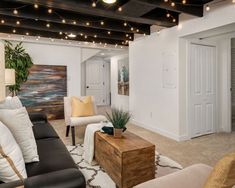 a living room filled with furniture and lights