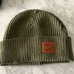 Brand New Never Worn Casual Beanie With Curved Brim For Cold Weather, Casual Beanie For Cold Weather With Curved Brim, Casual Outdoor Beanie With Curved Brim, Khaki Winter Hats, One Size Fits Most, Khaki Winter Hat One Size Fits Most, Casual Adjustable Warm Hat, Fall Beanie For Outdoor Activities, Khaki Cap For Fall, Casual Winter Hats For Camping