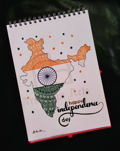 a spiral notebook with the map of india on it