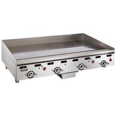 an electric griddle grill with four burners on the front and two side burners on