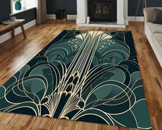 a living room area rug with an art deco design on the floor and wood floors