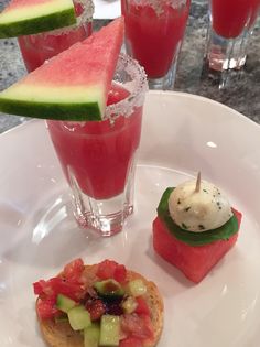 watermelon and cucumber cocktails on a white plate