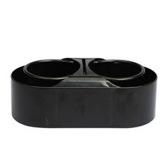 three black plastic cups sitting on top of each other in front of a white background