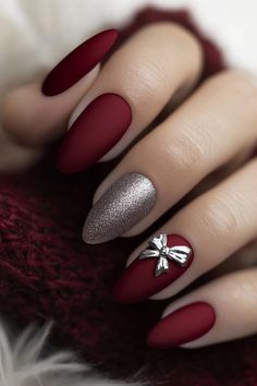 17 Simple Christmas Nail Design Ideas to Sparkle Through the Season Sweater Nail Christmas, Christmas Nail Coffin Shape, Simple Christmas Nail Art Ideas, Matte Red Nails Christmas, Winter Nail Ideas Red, Xmas Red Nails Christmas Design, Simple Christmas Nails Design, Red And Black Winter Nails, Present Bow Nails