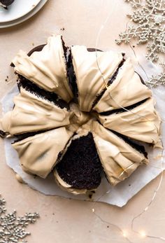 a chocolate bunt cake with frosting on top