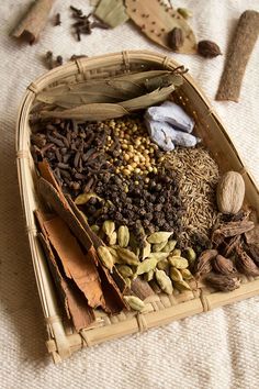 a basket filled with lots of different types of spices