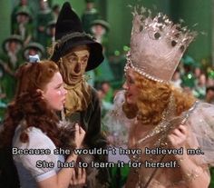 the wizard and the maiden are talking to each other in front of an audience with words written on them