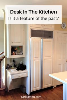 a kitchen with white cabinets and wood floors is featured in the article, desk in the kitchen is it a feature of the past?