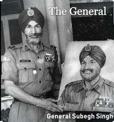 a man in uniform standing next to a portrait of a man wearing a turban