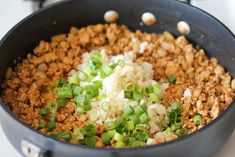 the food is prepared and ready to be cooked in the pot on the stove top