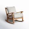 a wooden rocking chair with white upholstered cushions