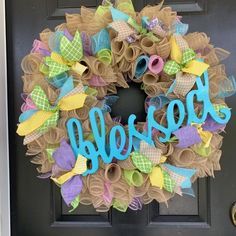 a colorful wreath with the word welcome on it