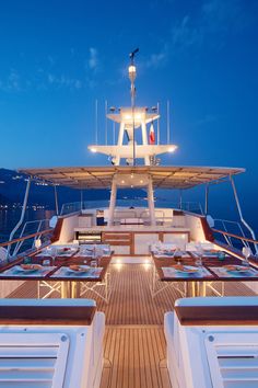 the back deck of a boat at night