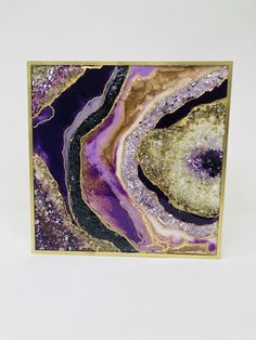 a purple and gold abstract painting on a white background