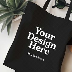 Instantly enhance your online store with our high-quality digital download of this blank tote bag mockup image! Perfect for showcasing your unique designs and artwork. By using our mockups, you can easily place your artwork on the bag and create a stunning visual representation of your products. ⚡ INSTANT DOWNLOAD: Your JPG file at size 3461px x 3461px is instantly downloaded after your payment has cleared with Etsy. No physical product will be sent to you. No refund on digital products. More information about Etsy downloads can be found here: https://www.etsy.com/help/article/3949 If you have trouble using this file, please contact me - I'm happy to help! ⚡ TERMS OF USE: You are allowed to use this product for personal and commercial use. You cannot resell this digital file. By utilising Customizable Eco-friendly Black Bags, Customizable Black Rectangular Bag, Customizable Black Canvas Bag For Daily Use, Black Tote Bag For Personal Use, Customizable Black Canvas Bag For Everyday Use, Customizable Black Rectangular Canvas Bag, Customizable Black Everyday Bags, Rectangular Bag With Graphic Design, Rectangular Bag With Graphic Design For Everyday