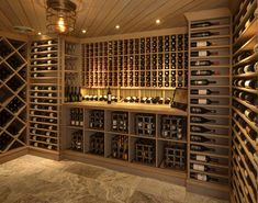 a wine cellar filled with lots of bottles