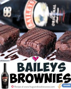 bailey's brownies with chocolate drizzled on them and a bottle of booze