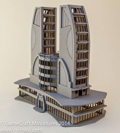 an architectural model of a building made out of paper