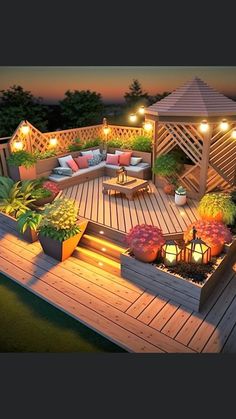 a deck lit up with lights and potted plants