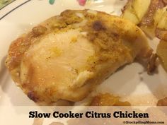 a close up of a plate of food with chicken and potatoes on the side that says slow cooker citrus chicken