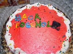 a birthday cake with the words back to school written on it and confetti sprinkles