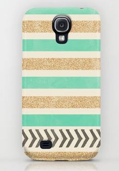 a phone case with gold glitter and green stripes on the front, featuring an arrow pattern