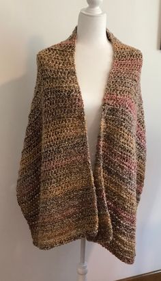 "This shawl is made with Homespun yarn which is 98% acrylic and 2% polyester. So soft to the touch and warm. It measures about 22\" wide and 68\" long. I love these shawls because they are super soft and so nice against the skin. Drape it over your shoulders and arms watching tv or reading a book. Perfect gift for someone. Machine wash and dry on delicate. A prayer shawl is made with prayers being said so the person who recieves the shawl has love and hope and comfort." Knit Shawl Scarves For Fall, Hand Knitted Shawl Wrap For Fall, One Size Brown Knitted Scarves, Fall Yarn Shawl Scarf, Crochet Shawl For Fall, One Size, Crochet Shawl For Fall, Knit Fabrication Shawl For Fall, Fall Knitted Shawl, Fall Knit Shawl