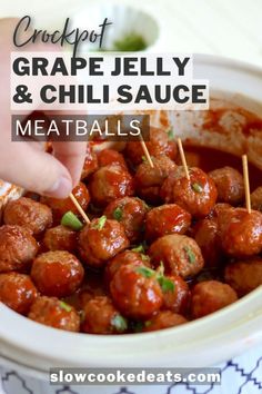 a bowl filled with meatballs and garnished with toothpicks in it